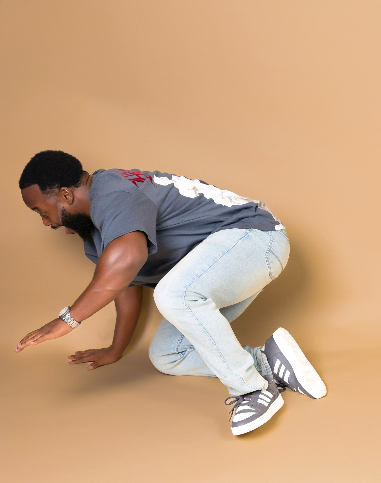 Lex in a playful crouching pose